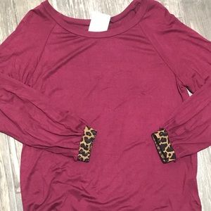 Deep burgundy top with leopard cuff.
